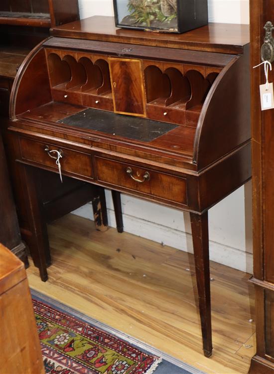 A mahogany tambour fronted roll top desk W.93cm